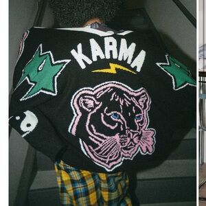 Dressed in Lala mother is mothering (karma version)